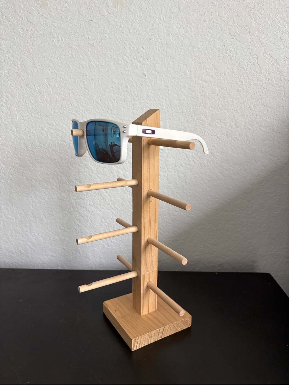 Oakley White Frame Sunglasses with Blue Mirrored Lenses